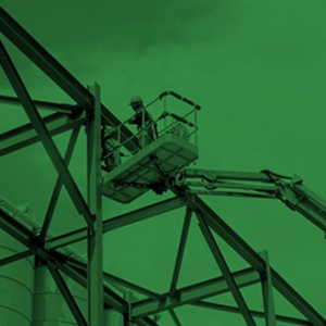 Man going up in a lift to work at height